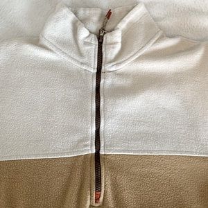 beige & cream coloured half zip fleece with burnt orange accents🤎